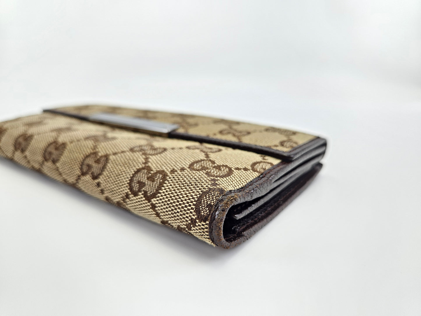 Gucci Engraved Metal Plate Clutch Wallet