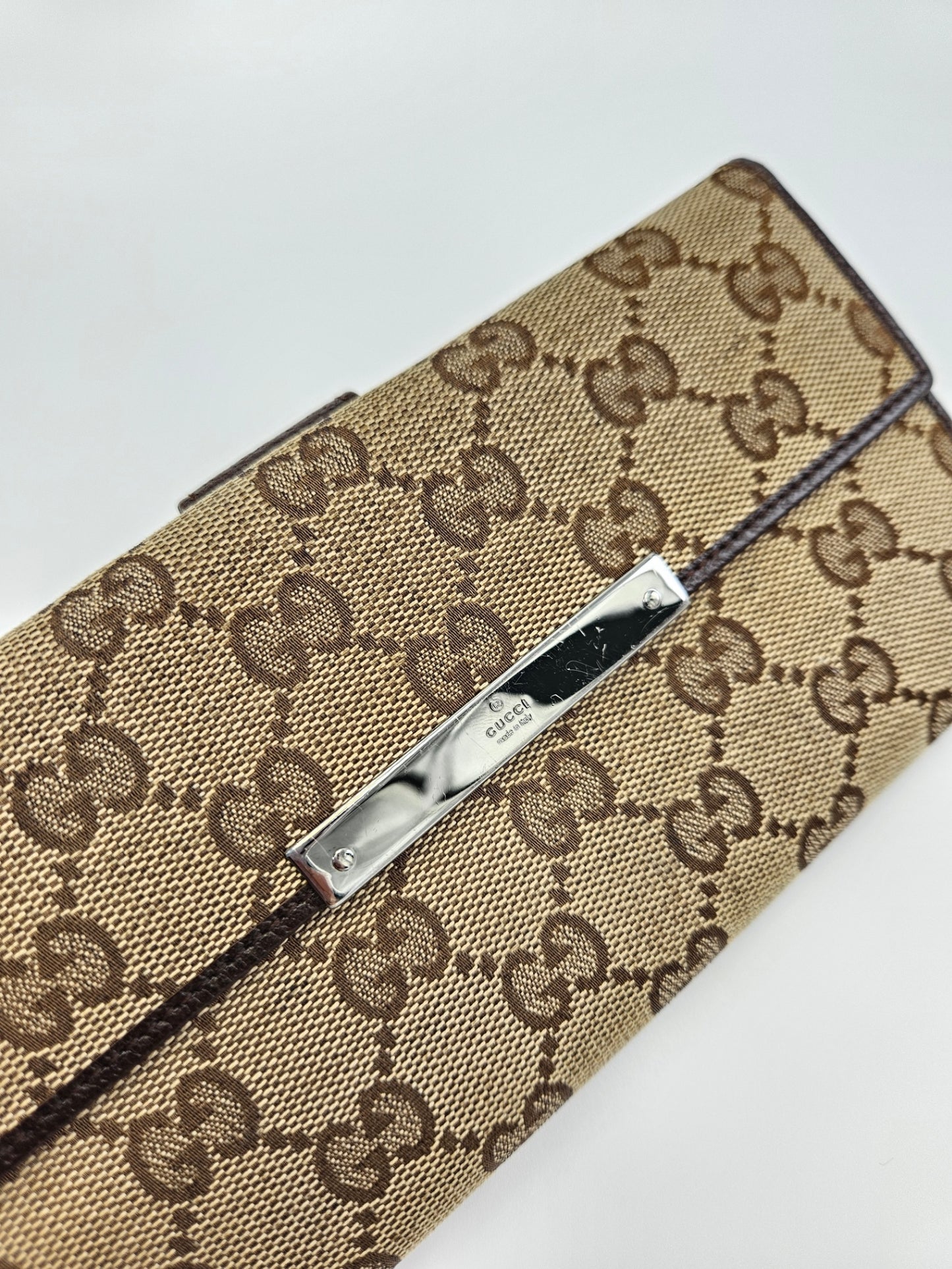 Gucci Engraved Metal Plate Clutch Wallet