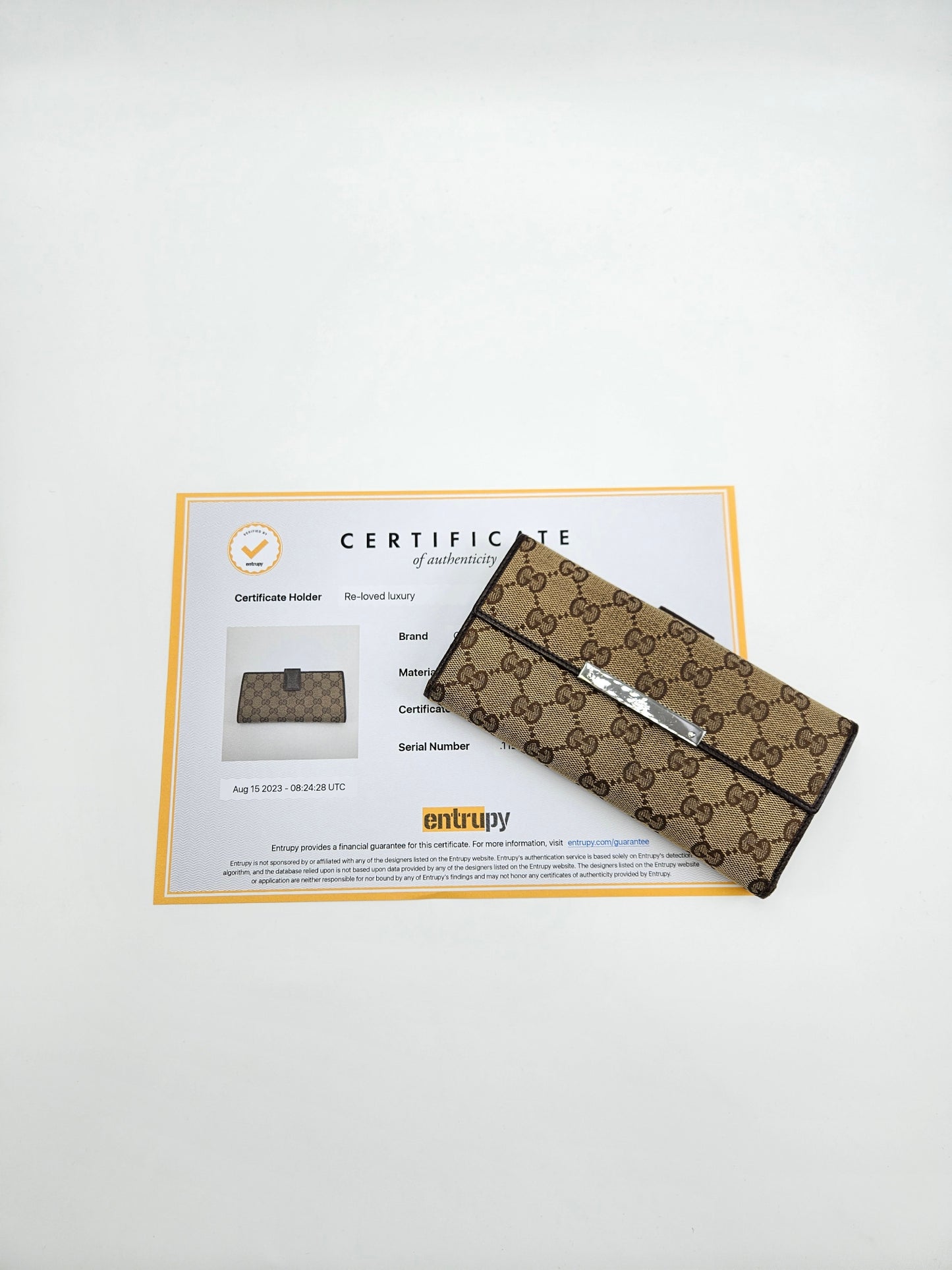 Gucci Engraved Metal Plate Clutch Wallet